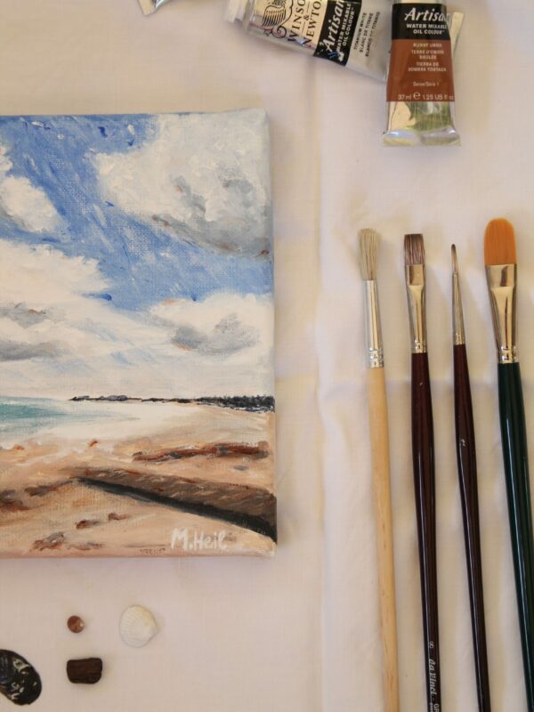 beach oil painting with art supplies